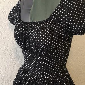 Black polka dot “Valencia” swing dress